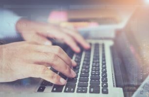 double-exposure-of-businessman-hand-working-laptop_2034-159